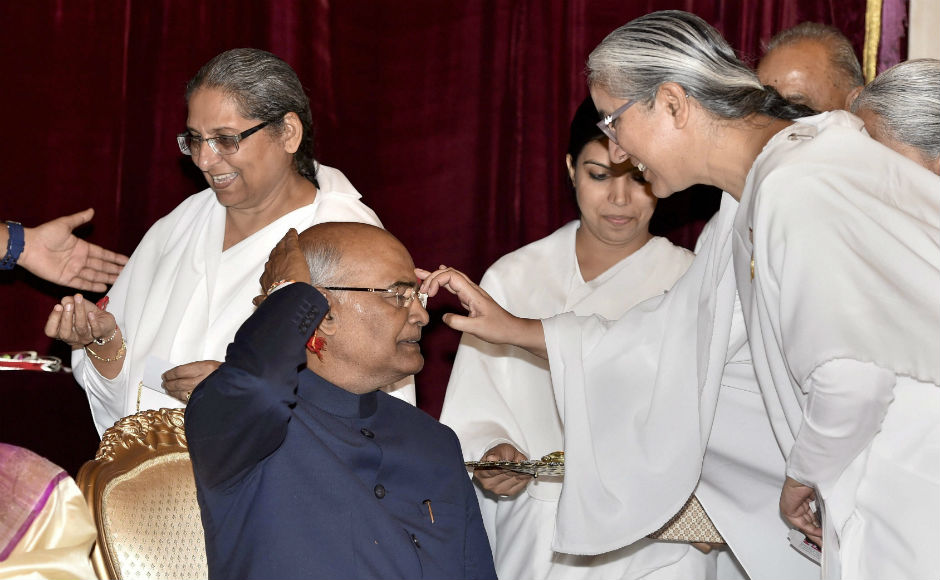 Members of Gujarat's Koli community met and greeted President Ramnath Kovind and his wife on the occasion of Raksha Bandhan on Monday. PTI Members of Gujarat's Koli community met and greeted President Ramnath Kovind and his wife on the occasion of Raksha Bandhan on Monday. PTI
