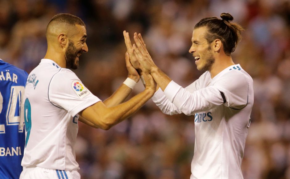 Real Madrids Gareth Bale celebrates scoring their first goal with Karim Benzema. Reuters Real Madrids Gareth Bale celebrates scoring their first goal with Karim Benzema. Reuters