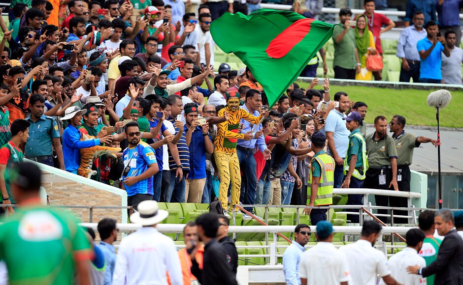 Bangladeshi supporters rejoiced the momentous occasion as hundreds thronged the stadium in Dhaka to witness their team create history. AP Bangladeshi supporters rejoiced the momentous occasion as hundreds thronged the stadium in Dhaka to witness their team create history. AP