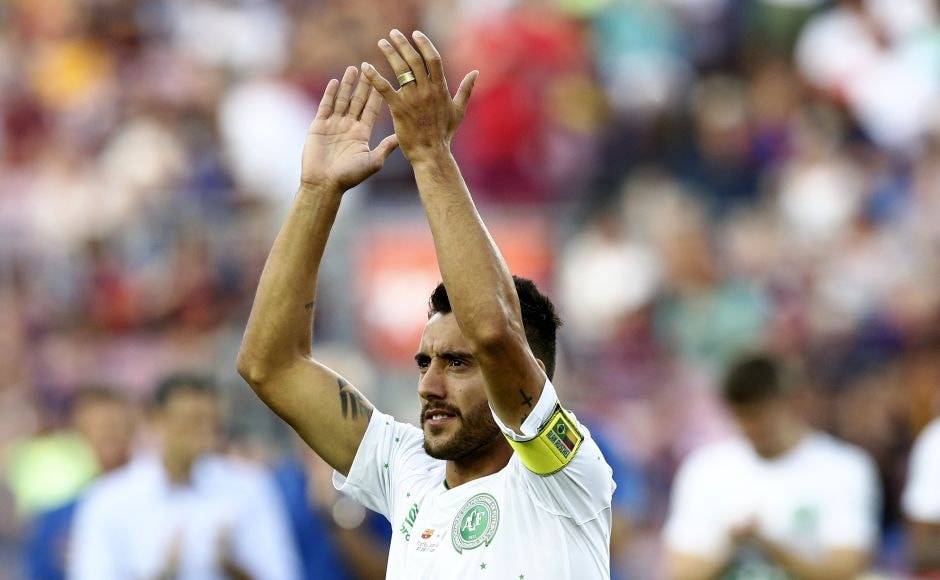 Alan Ruschel wore the captain's armband for Chapecoense during the 36 minutes he played before being substituted. He received a standing ovation from the crowd, which he returned by applauding with his hands held high as he slowly walked to the dugout. AP Alan Ruschel wore the captain's armband for Chapecoense during the 36 minutes he played before being substituted. He received a standing ovation from the crowd, which he returned by applauding with his hands held high as he slowly walked to the dugout. AP
