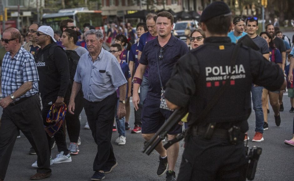 Security was stepped up for the match after the attack and police put up scores of roadblocks across northeast Spain on Sunday in hopes of capturing a fugitive suspect at large following the vehicle attack. AP Security was stepped up for the match after the attack and police put up scores of roadblocks across northeast Spain on Sunday in hopes of capturing a fugitive suspect at large following the vehicle attack. AP
