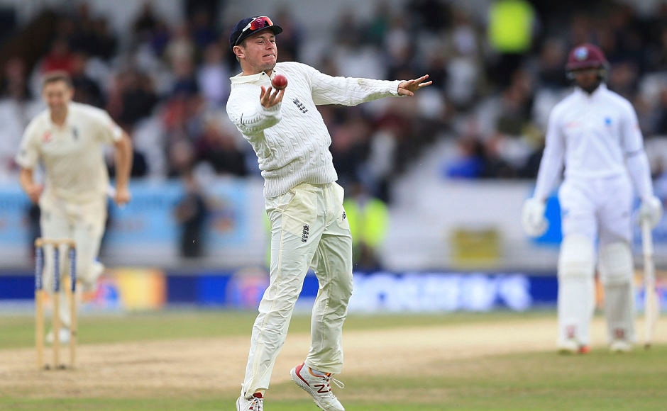 Substitute fielder Mason Crane celebrates after taking a stunner to send Roston Chase back to the hut for 30. AP Substitute fielder Mason Crane celebrates after taking a stunner to send Roston Chase back to the hut for 30. AP