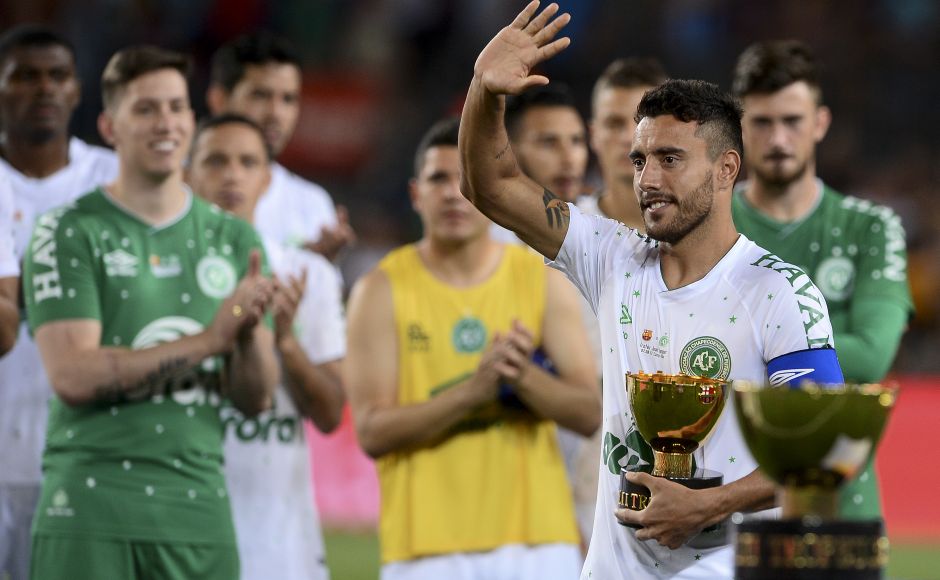 Chapecoense's defender Alan Ruschel holds the second place trophy. Eight months after surviving the plane crash that killed most of his Chapecoense teammates, Ruschel returned to the football field. AFP Chapecoense's defender Alan Ruschel holds the second place trophy. Eight months after surviving the plane crash that killed most of his Chapecoense teammates, Ruschel returned to the football field. AFP