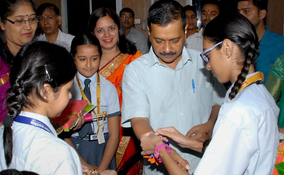 Delhi Chief Minister Arvind Kejriwal celebrated the festival with school girls and a group of Brahma Kumaris who tied rakhis on his wrist. PTI Delhi Chief Minister Arvind Kejriwal celebrated the festival with school girls and a group of Brahma Kumaris who tied rakhis on his wrist. PTI
