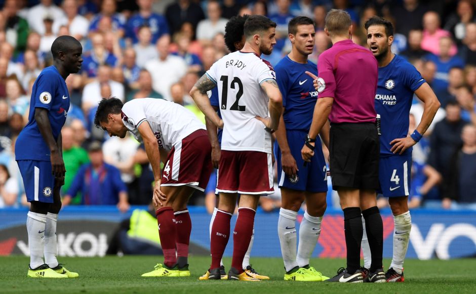 Chelsea were down to nine men as new captain Gary Cahill was sent off after only 14 minutes and Cesc Fabregas following late on. Fabregas remonstrates with referee Craig Pawson after being sent off. Reuters Chelsea were down to nine men as new captain Gary Cahill was sent off after only 14 minutes and Cesc Fabregas following late on. Fabregas remonstrates with referee Craig Pawson after being sent off. Reuters