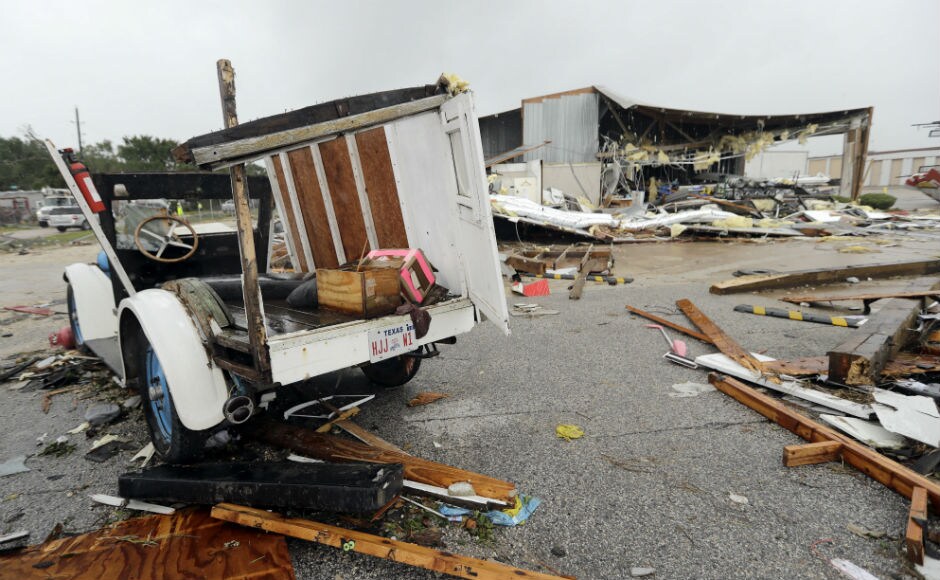 As stunned families surveyed the wreckage of destroyed homes and roads flooded or clogged with debris, Texas governor Greg Abbott has warned people to brace for a long recovery. AP As stunned families surveyed the wreckage of destroyed homes and roads flooded or clogged with debris, Texas governor Greg Abbott has warned people to brace for a long recovery. AP