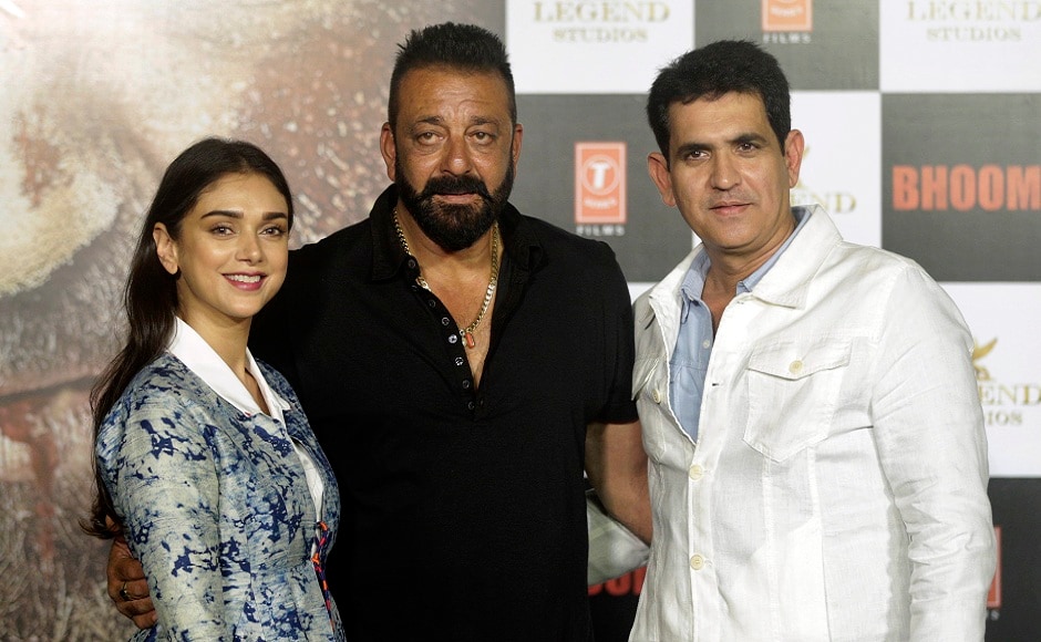 Bollywood actors Aditi Rao Hydari (left) Sanjay Dutt (center) along with film director Omung Kumar pose during the trailer launch of film Bhoomi in Mumbai, India, Thursday, 10 August, 2017. The film is scheduled for release on 22 September, 2017. Image via AP/Rafiq Maqbool Bollywood actors Aditi Rao Hydari (left) Sanjay Dutt (center) along with film director Omung Kumar pose during the trailer launch of film Bhoomi in Mumbai, India, Thursday, 10 August, 2017. The film is scheduled for release on 22 September, 2017. Image via AP/Rafiq Maqbool