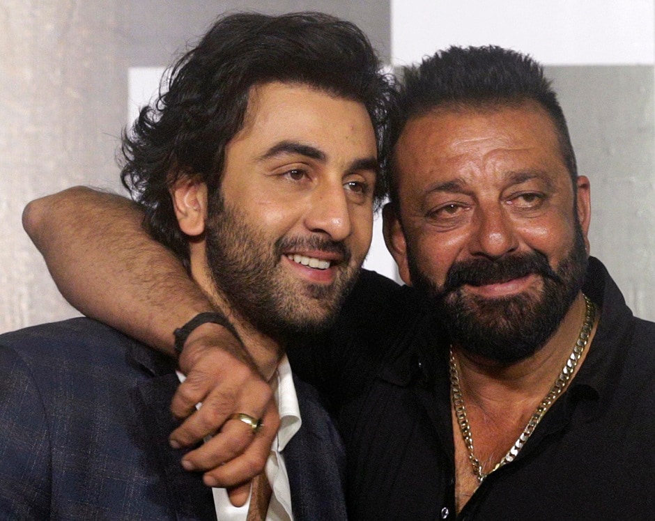 Ranbir Kapoor (left) and Sanjay Dutt pose during the trailer launch of film Bhoomi in Mumbai, India, Thursday, 10 August, 2017. Kapoor will also be seen playing Sanjay Dutt in the upcoming biopic film. Image via AP/Rafiq Maqbool Ranbir Kapoor (left) and Sanjay Dutt pose during the trailer launch of film Bhoomi in Mumbai, India, Thursday, 10 August, 2017. Kapoor will also be seen playing Sanjay Dutt in the upcoming biopic film. Image via AP/Rafiq Maqbool