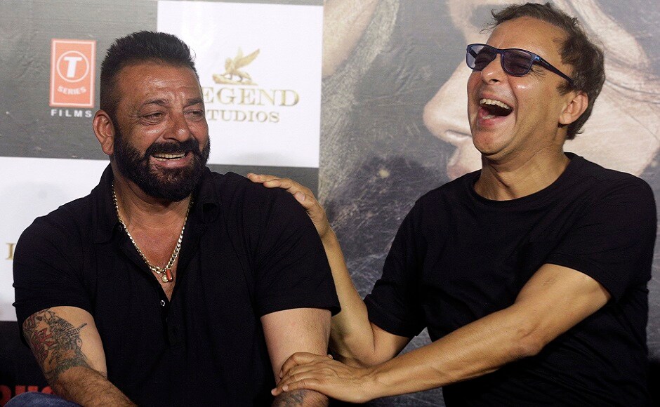 Sanjay Dutt (left) shares a light moment with Indian film director Vidhu Vinod Chopra during the trailer launch of film Bhoomi in Mumbai, India, Thursday, 10 August, 2017. Both Dutt and Chopra have collaborated many times in the past, most notably in the Munnabhai films. Image via AP/Rafiq Maqbool Sanjay Dutt (left) shares a light moment with Indian film director Vidhu Vinod Chopra during the trailer launch of film Bhoomi in Mumbai, India, Thursday, 10 August, 2017. Both Dutt and Chopra have collaborated many times in the past, most notably in the Munnabhai films. Image via AP/Rafiq Maqbool