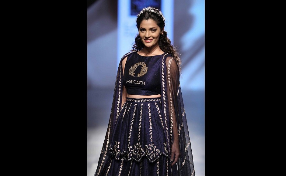 Saiyami Kher looked stunning in a deep indigo lehenga and choli with wreath embroidery and a sparkling dupatta. Saiyami Kher looked stunning in a deep indigo lehenga and choli with wreath embroidery and a sparkling dupatta.