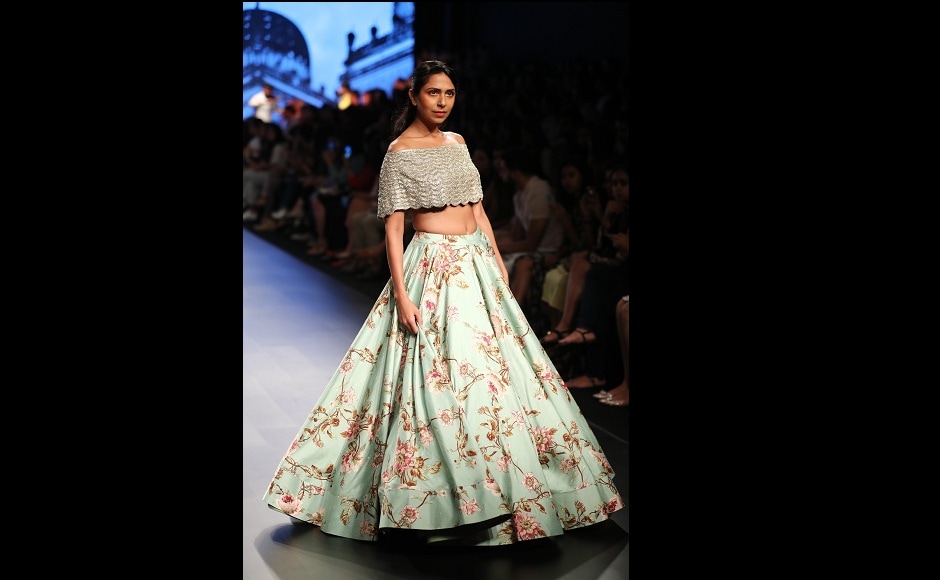Scallop details, flirty frills, intimidating volume, clean cut silhouettes, ruffle detailing and sleek layering were the basis of Reddy’s collection this year, at the Lakmé Fashion Week 2017. Scallop details, flirty frills, intimidating volume, clean cut silhouettes, ruffle detailing and sleek layering were the basis of Reddy’s collection this year, at the Lakmé Fashion Week 2017.
