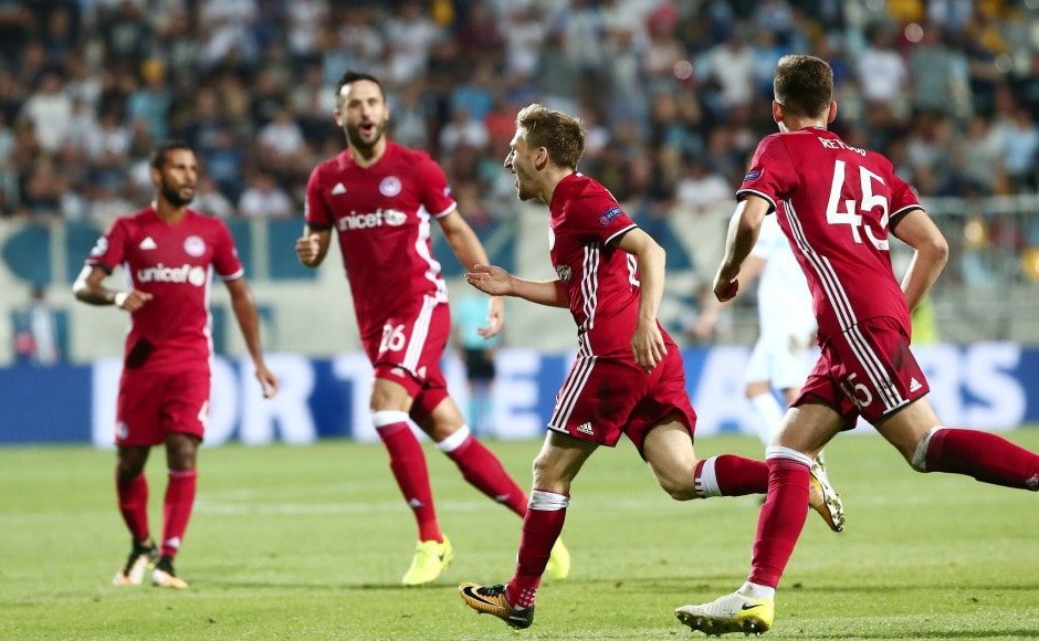 Olympiacos celebrate their goal against Croatian side Rijeka. They also won the first leg 2-1, hence qualified for the group stage of Champions League. Image Courtesy: Twitter @olympiacos_org Olympiacos celebrate their goal against Croatian side Rijeka. They also won the first leg 2-1, hence qualified for the group stage of Champions League. Image Courtesy: Twitter @olympiacos_org