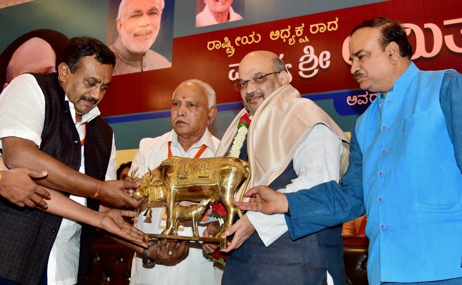 Amit Shah was presented a memento by state BJP president BS Yeduyurappa and Union minister Ananth Kumar during an intellectual meet in Bengaluru on Saturday. PTI Amit Shah was presented a memento by state BJP president BS Yeduyurappa and Union minister Ananth Kumar during an intellectual meet in Bengaluru on Saturday. PTI