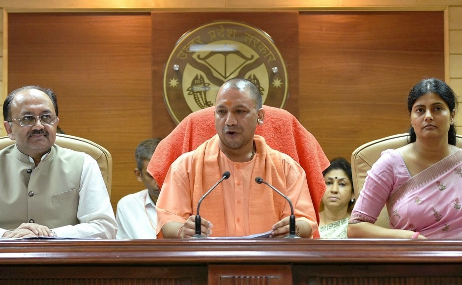 Yogi Aditiyanath addresses a press conference in Lucknow with Union minister Anupriya Patel (R) and Uttar Pradesh health minister Siddharth Nath Singh (L) on Saturday. Adityanath had earlier in May 2017, launched a campaign to eradicate deadly encephalitis disease that had led to deaths of hundreds of children every year in Uttar Pradesh. PTI Yogi Aditiyanath addresses a press conference in Lucknow with Union minister Anupriya Patel (R) and Uttar Pradesh health minister Siddharth Nath Singh (L) on Saturday. Adityanath had earlier in May 2017, launched a campaign to eradicate deadly encephalitis disease that had led to deaths of hundreds of children every year in Uttar Pradesh. PTI