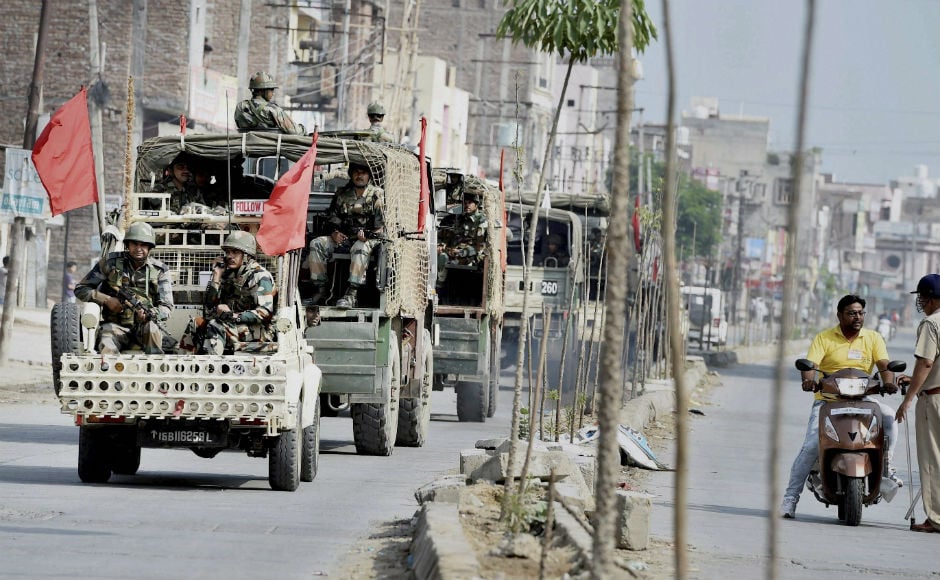 Army forces can be seen conducting a flag march in Panchkula, the epicenter of Friday's violence. Security forces remained on high alert on Saturday. Haryana DGP BS Sandhu said that the situation is "totally under control". Police have detained 550 Dera Sacha Sauda supporters and confiscated 65 vehicles. PTI Army forces can be seen conducting a flag march in Panchkula, the epicenter of Friday's violence. Security forces remained on high alert on Saturday. Haryana DGP BS Sandhu said that the situation is "totally under control". Police have detained 550 Dera Sacha Sauda supporters and confiscated 65 vehicles. PTI