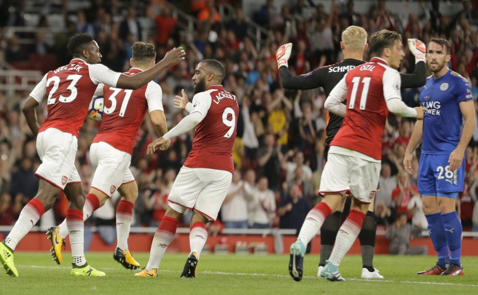 Arsenal's Danny Welbeck had the last word of the first half for the home side when he equalised from close range in added time. Welbeck, left, is congratulated by teammate Alexandre Lacazette after he scored his side's second goal of the game. AP Arsenal's Danny Welbeck had the last word of the first half for the home side when he equalised from close range in added time. Welbeck, left, is congratulated by teammate Alexandre Lacazette after he scored his side's second goal of the game. AP