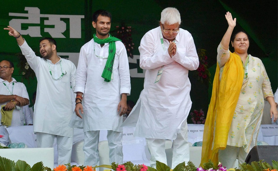 Rashtriya Janata Dal (RJD) chief Lalu Prasad with his daughter Misa Bharti and sons Tej Pratap and Tejashwi Yadav during "BJP Bhagao, Desh Bachao" rally in Gandhi Maidan in Patna on Sunday. In a display of Opposition unity against the BJP political heavyweights including West Bengal chief minister Mamata Banerjee and Samajwadi Party president Akhilesh Yadav shared a platform at Lalu Prasad's mega rally. PTI Rashtriya Janata Dal (RJD) chief Lalu Prasad with his daughter Misa Bharti and sons Tej Pratap and Tejashwi Yadav during "BJP Bhagao, Desh Bachao" rally in Gandhi Maidan in Patna on Sunday. In a display of Opposition unity against the BJP political heavyweights including West Bengal chief minister Mamata Banerjee and Samajwadi Party president Akhilesh Yadav shared a platform at Lalu Prasad's mega rally. PTI