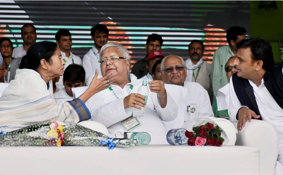 Lalu Prasad Yadav with Trinamool Congress supremo Mamata Banerjee and former Uttar Pradesh chief minister Akhilesh Yadav. Lalu has said the 'BJP bhagao desh bachao' rally would herald the decline of the BJP-led National Democratic Alliance in the 2019 Lok Sabha election. PTI Lalu Prasad Yadav with Trinamool Congress supremo Mamata Banerjee and former Uttar Pradesh chief minister Akhilesh Yadav. Lalu has said the 'BJP bhagao desh bachao' rally would herald the decline of the BJP-led National Democratic Alliance in the 2019 Lok Sabha election. PTI