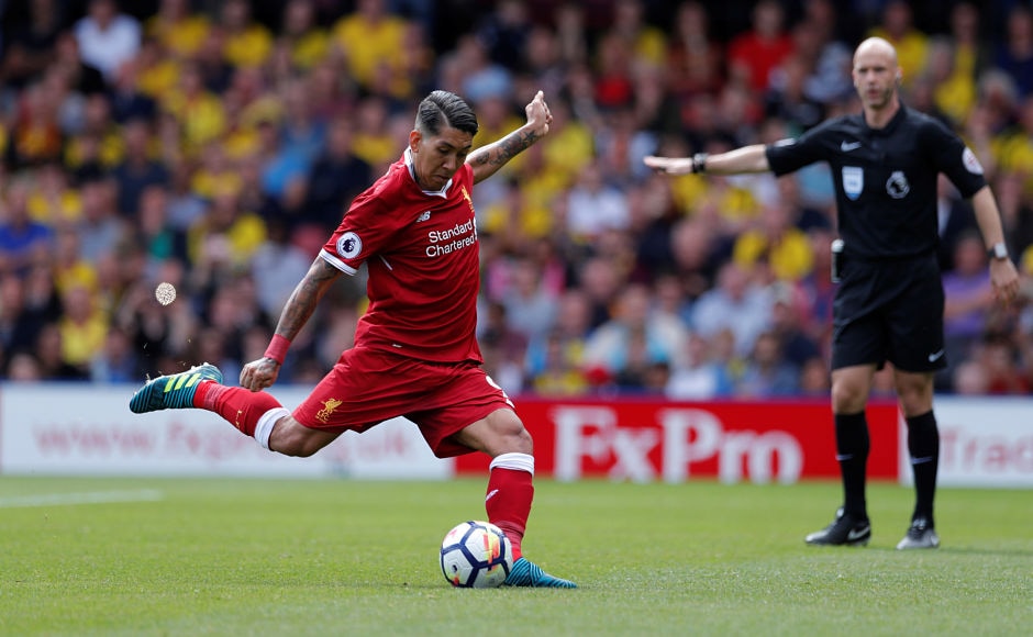 Liverpool's forward Roberto Firmino made no mistake from the spot as he sent Heurelho Gomes the wrong way and Liverpool were level again at 2-2. Reuters Liverpool's forward Roberto Firmino made no mistake from the spot as he sent Heurelho Gomes the wrong way and Liverpool were level again at 2-2. Reuters