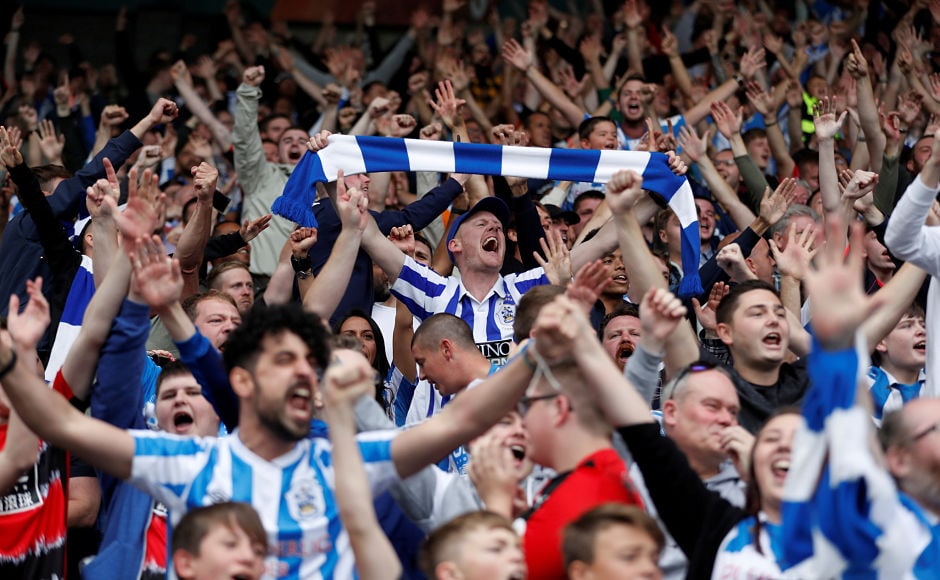 The John Smith's stadium in West Yorkshire was filled with ecstatic Huddersfield Town fans who enjoyed the club's first victory in top-flight football in 45 years. Reuters The John Smith's stadium in West Yorkshire was filled with ecstatic Huddersfield Town fans who enjoyed the club's first victory in top-flight football in 45 years. Reuters