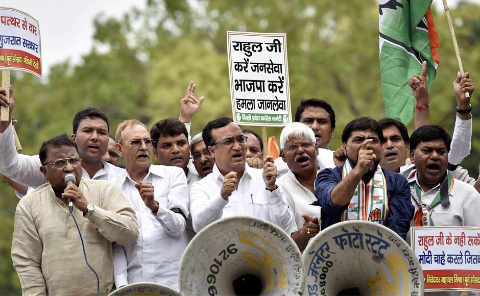 Delhi Pradesh Congress Committee president Ajay Maken along with other leaders protest against the attack on Rahul Gandhi's car in Gujarat, at Gujarat Bhawan in New Delhi on Saturday. PTI Delhi Pradesh Congress Committee president Ajay Maken along with other leaders protest against the attack on Rahul Gandhi's car in Gujarat, at Gujarat Bhawan in New Delhi on Saturday. PTI