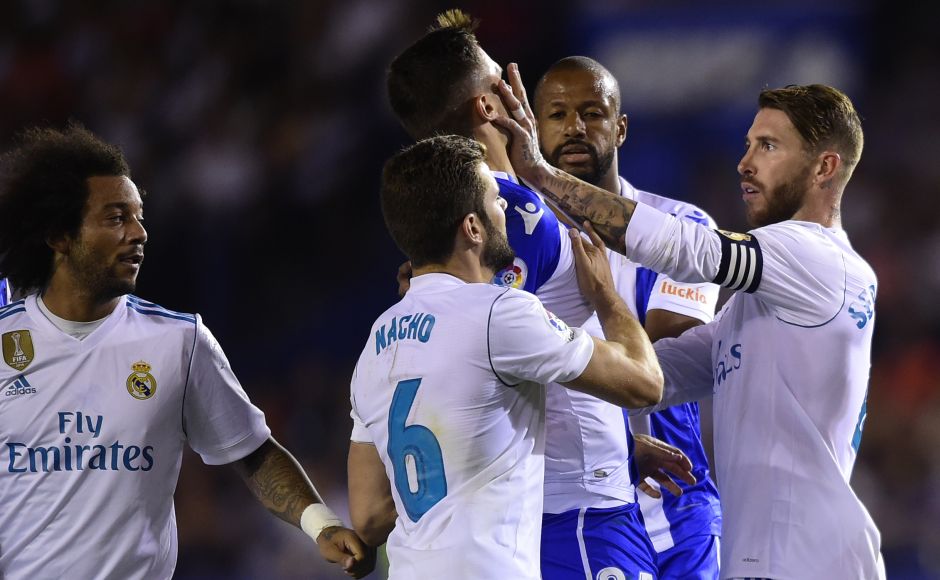 Sergio Ramos got away with only a yellow card for a slap on Swiss defender Fabian Schar in the second half. However, Ramos was dismissed late in the match for an elbow on Borja Valle. AFP Sergio Ramos got away with only a yellow card for a slap on Swiss defender Fabian Schar in the second half. However, Ramos was dismissed late in the match for an elbow on Borja Valle. AFP
