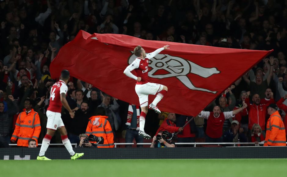 Arsenal's Aaron Ramsey equalised with a shot from close range seven minutes from time with Mesut Ozil appearing to handle the ball in the build-up. Ramsey pictured celebrating scoring their third goal. Reuters Arsenal's Aaron Ramsey equalised with a shot from close range seven minutes from time with Mesut Ozil appearing to handle the ball in the build-up. Ramsey pictured celebrating scoring their third goal. Reuters