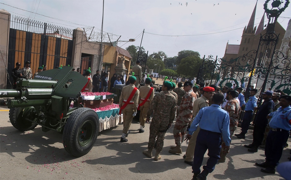 Army troops escort the casket of for a funeral at the St Patrick's Cathedral in Karachi. Pfau also played an instrumental role in helping victims of devastating flooding in 2010, which left millions of people homeless across swathes of the country. AP Army troops escort the casket of for a funeral at the St Patrick's Cathedral in Karachi. Pfau also played an instrumental role in helping victims of devastating flooding in 2010, which left millions of people homeless across swathes of the country. AP