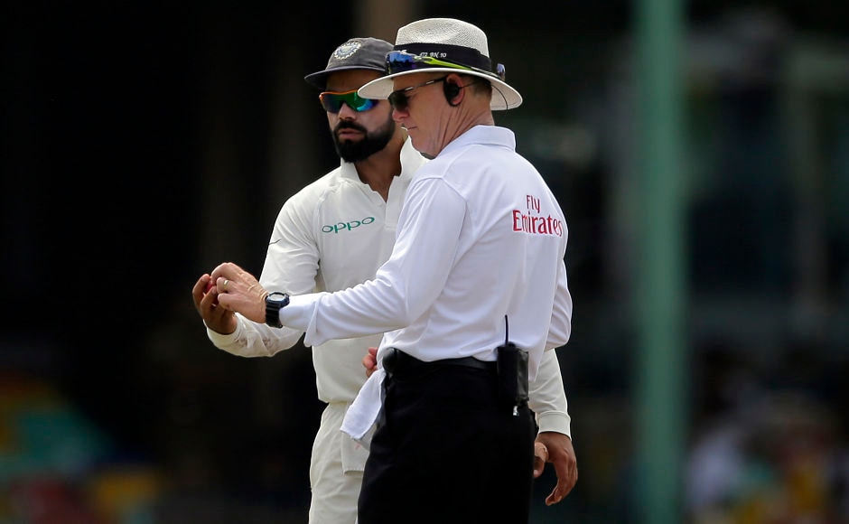 Captain Virat Kohli and umpire Bruce Oxenford inspect the out-of-shape ball during the second innings of the match. The ball was replaced at the start of the 33rd over. AP Captain Virat Kohli and umpire Bruce Oxenford inspect the out-of-shape ball during the second innings of the match. The ball was replaced at the start of the 33rd over. AP
