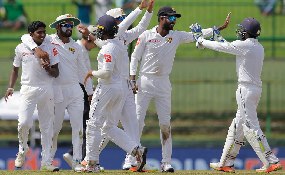 Sri Lanka's chinaman Lakshan Sandakan dismissed Cheteshwar Pujara for 8 to reduce the visitors to 229/3 from 188/0. AP Sri Lanka's chinaman Lakshan Sandakan dismissed Cheteshwar Pujara for 8 to reduce the visitors to 229/3 from 188/0. AP
