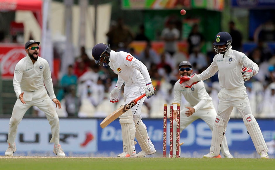 India's Ravindra Jadeja outfoxed Sri Lanka's Dhananjaya de Silva for a duck with an absolute gem. The wicket reduced the home side to 122/6 in the 1st innings. AP India's Ravindra Jadeja outfoxed Sri Lanka's Dhananjaya de Silva for a duck with an absolute gem. The wicket reduced the home side to 122/6 in the 1st innings. AP
