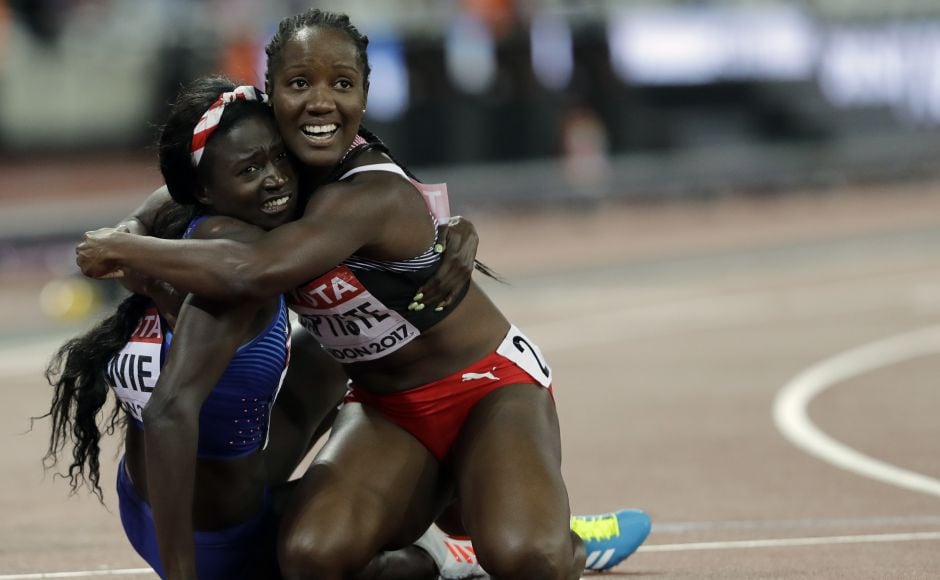 United States' Tori Bowie, left, celebrates with Trinidad and Tobago's Kelly-Ann Baptiste after winning the gold medal in the Women's 100m final during the World Athletics Championships in London Sunday. AP United States' Tori Bowie, left, celebrates with Trinidad and Tobago's Kelly-Ann Baptiste after winning the gold medal in the Women's 100m final during the World Athletics Championships in London Sunday. AP