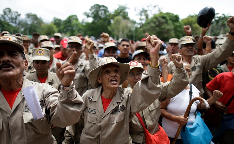 Venezuelan troops taught civilians how to use their fists, rifles, bazookas and anti-aircraft guns at the Caracas military academy on 26 August. AP Venezuelan troops taught civilians how to use their fists, rifles, bazookas and anti-aircraft guns at the Caracas military academy on 26 August. AP