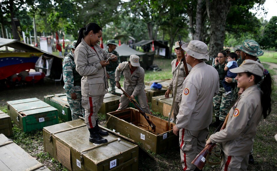 War planes, tanks and 20,000 troops of National Bolivarian Armed Forces were deployed along with 700,000 reservists and civilians. AP War planes, tanks and 20,000 troops of National Bolivarian Armed Forces were deployed along with 700,000 reservists and civilians. AP