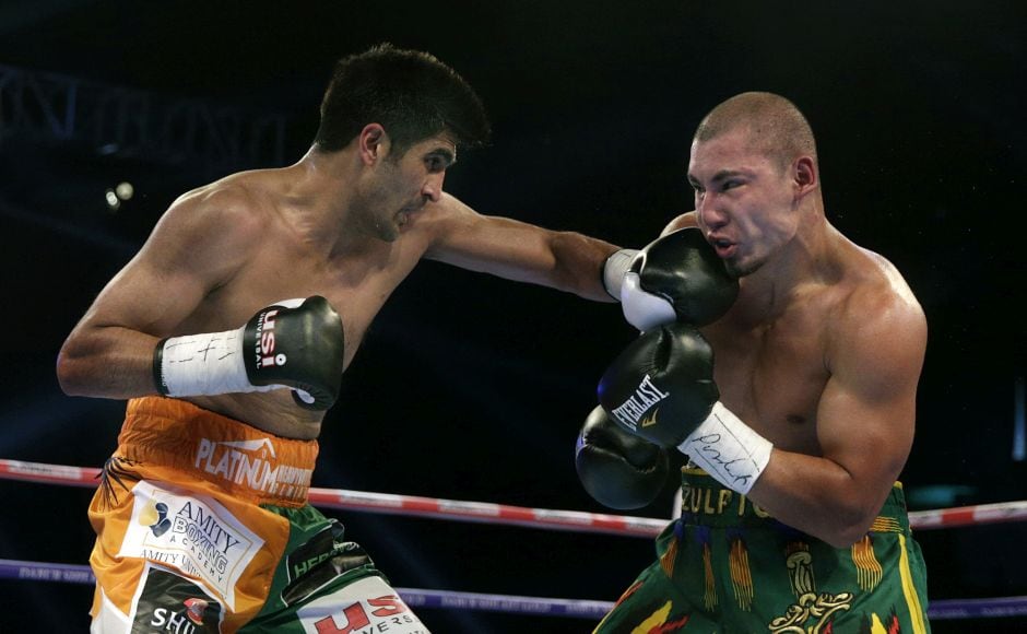Vijender Singh also took his opponent's WBO Oriental Super Middleweight belt. AP Vijender Singh also took his opponent's WBO Oriental Super Middleweight belt. AP