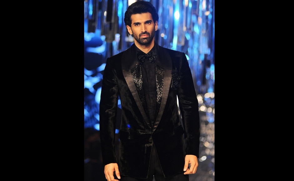 Aditya Roy Kapur wore a bespoke suit and closed Manish Malhotra's show along with Fernandez. Image from AFP. Aditya Roy Kapur wore a bespoke suit and closed Manish Malhotra's show along with Fernandez. Image from AFP.