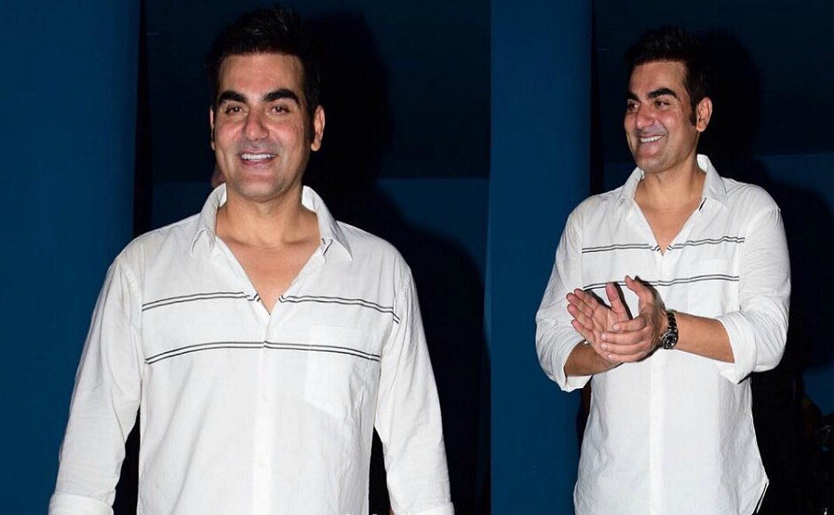 Khan posing for media at his birthday bash. Khan posing for media at his birthday bash.