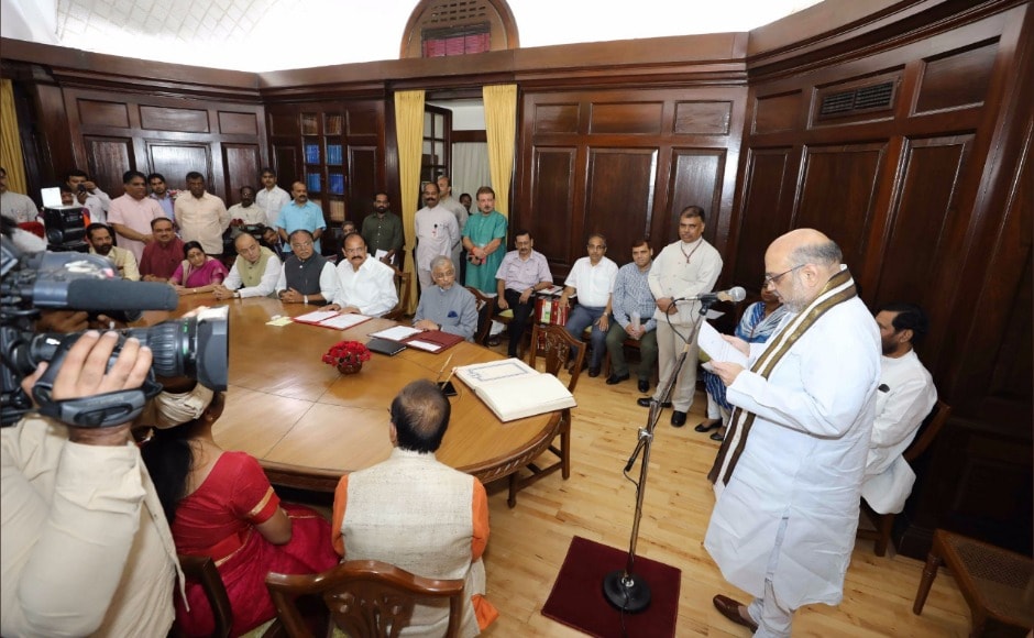At the swearing-in, they were accompanied by parliamentary affairs minister Ananth Kumar, finance minister Arun Jaitley and law minister Ravi Shankar Prasad along with others. While Shah took his pledge in Hindi, Irani took hers in Sanskrit. Twitter @Amit Shah At the swearing-in, they were accompanied by parliamentary affairs minister Ananth Kumar, finance minister Arun Jaitley and law minister Ravi Shankar Prasad along with others. While Shah took his pledge in Hindi, Irani took hers in Sanskrit. Twitter @Amit Shah