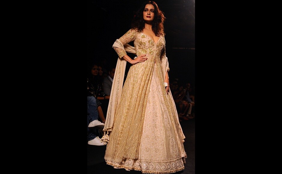 Dia Mirza looked ethereal in this white ensemble by Faabiiana label, which is owned by Kusum and Karishma Luharuwal. Image from AFP. Dia Mirza looked ethereal in this white ensemble by Faabiiana label, which is owned by Kusum and Karishma Luharuwal. Image from AFP.