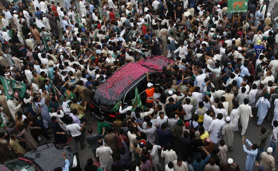 The roadshow via the iconic Grand Trunk Road, comes despite security threats, drawing thousands of supporters on its way to the provincial capital of Punjab. AP The roadshow via the iconic Grand Trunk Road, comes despite security threats, drawing thousands of supporters on its way to the provincial capital of Punjab. AP