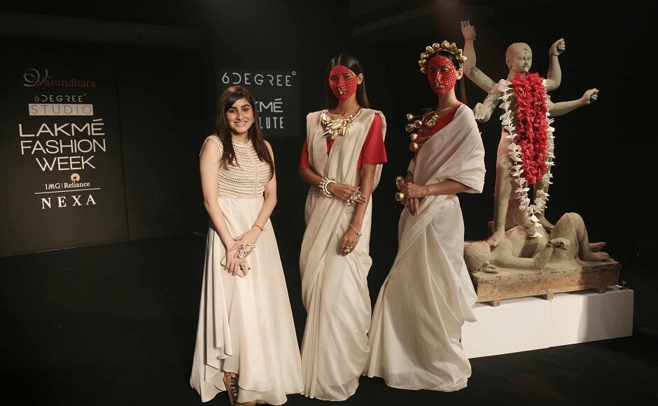 Designer Vasundhara Mantri poses with the models wearing her designs. The faces of the models were covered with red <em>bindis</em>, to lend a traditional feel to the creations. Designer Vasundhara Mantri poses with the models wearing her designs. The faces of the models were covered with red <em>bindis</em>, to lend a traditional feel to the creations.