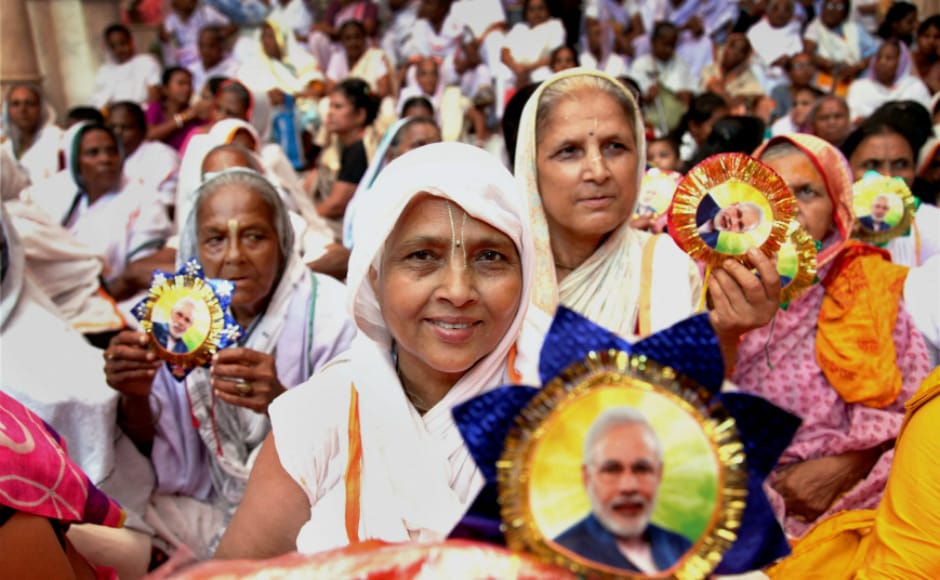 Widows celebrate Raksha Bandhan and show their "Modi Rakhi" during a function organised by Sulabh International at Gopinath Temple in Vrindavan, Uttar Pradesh. PTI Widows celebrate Raksha Bandhan and show their "Modi Rakhi" during a function organised by Sulabh International at Gopinath Temple in Vrindavan, Uttar Pradesh. PTI