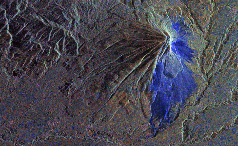 Mt. Sinabung in Indonesia captured by the RiSat-1. The blue areas represent fresh lava flows. Mt. Sinabung in Indonesia captured by the RiSat-1. The blue areas represent fresh lava flows.