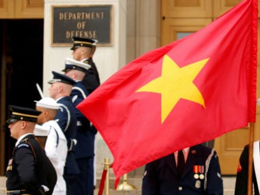 Vietnam flag flies. Reuters.