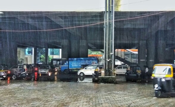 Mumbai rains throw life out of gear; schools shut, flight operations hit, local trains delayed Mumbai rains throw life out of gear; schools shut, flight operations hit, local trains delayed