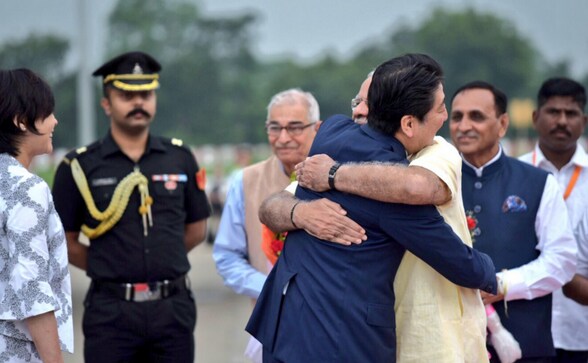 Shinzo Abe receives warm welcome at Ahmedabad airport; Narendra Modi extends bear hug