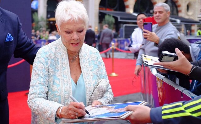 Dame Judi Dench signs autographs and speaks to media during the UK premiere of Victoria & Abdul. Image via Facebook Dame Judi Dench signs autographs and speaks to media during the UK premiere of Victoria & Abdul. Image via Facebook