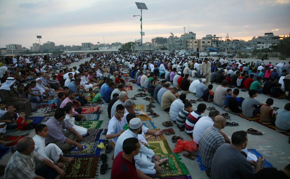 Muslims gather to pray on the first day of Eid al-Adha at the main square in Nusseirat refugee camp in Gaza. AP Muslims gather to pray on the first day of Eid al-Adha at the main square in Nusseirat refugee camp in Gaza. AP