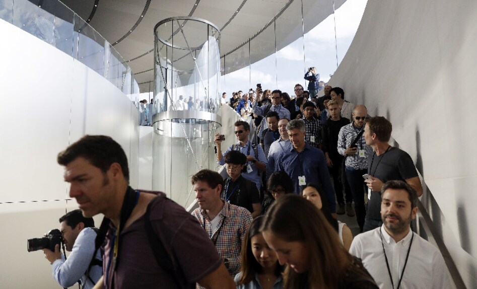 People arrive for a new product announcement at the Steve Jobs Theater. Image: AP Photo. People arrive for a new product announcement at the Steve Jobs Theater. Image: AP Photo.