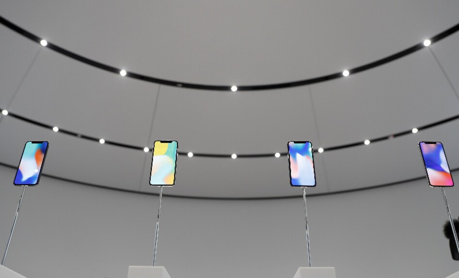 Apple iPhone X samples are displayed during a product launch event. Image: Reuters. Apple iPhone X samples are displayed during a product launch event. Image: Reuters.